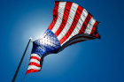 An American flag waving in the sky